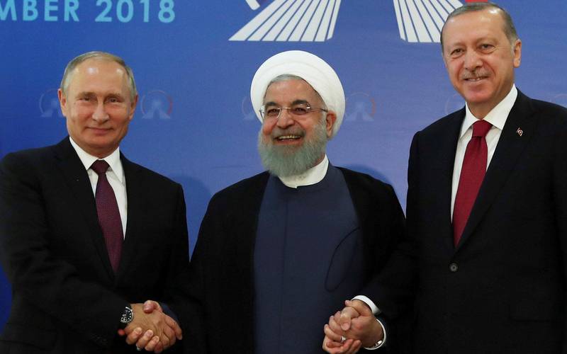 motsetninger: Professor Imad Salamey tror den voksende stabiliteten i Syria kan bringe motsetningene mellom Russland, Iran og Tyrkia til overflaten. Her et bilde fra september i fjor. Irans president Hassan Rouhani er flankert av Putin og Tyrkias president, Recep Tayyip Erdogan. FOTO: AP/NTB SCANPIX