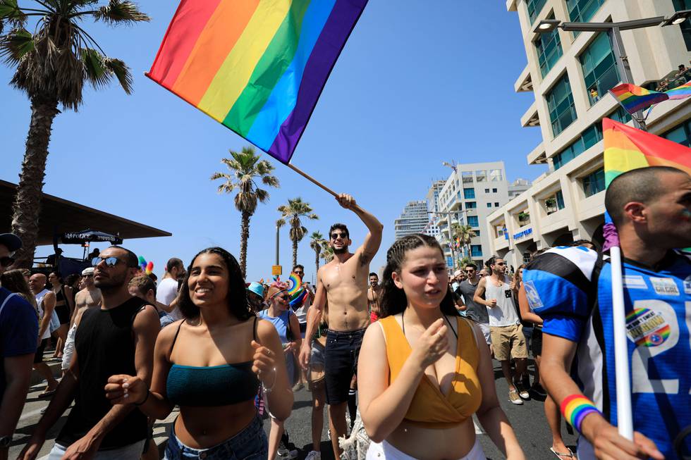 People take part in annual Gay Pride parade in Tel Aviv, Israel, Friday, June 14, 2019.(AP Photo/Tsafrir Abayov)