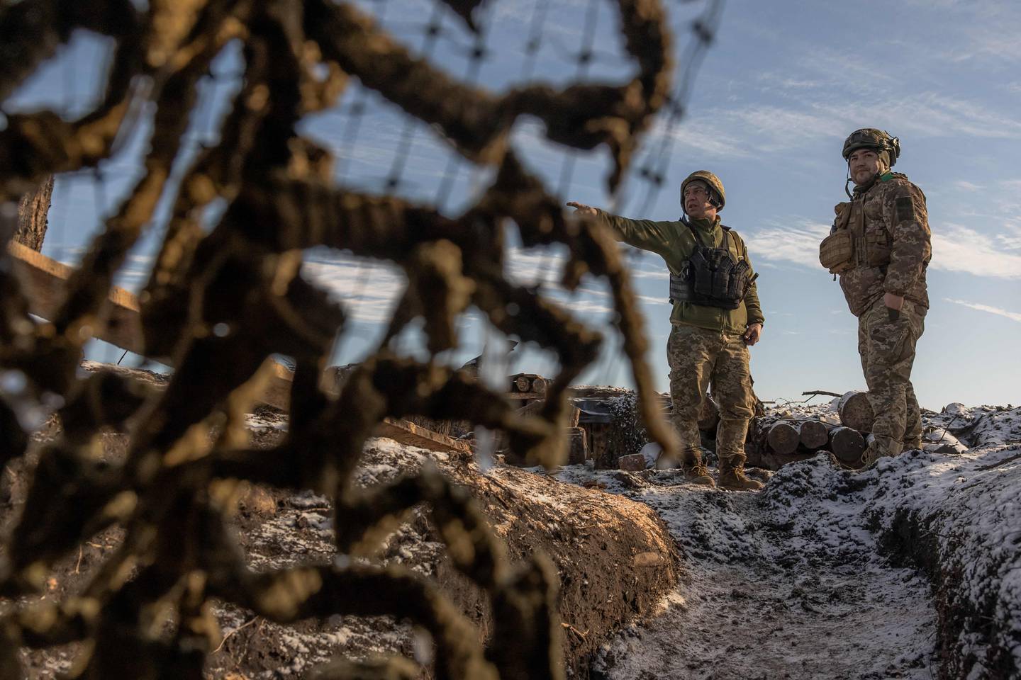 Ukrainian soldiers of the 41st brigade stand on a position near the frontline, outside Kupiansk, Kharkiv region, on January 23, 2024, amid the Russian invasion of Ukraine. (Photo by Roman PILIPEY / AFP)