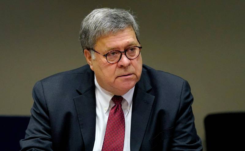 U.S. Attorney General William Barr meets with members of the St. Louis Police Department Thursday, Oct. 15, 2020, in St. Louis. The officers are among several in the department who have been shot in the line of duty this year. (AP Photo/Jeff Roberson, Pool)