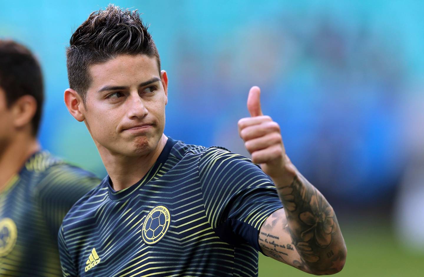 FILE - In this Sunday, June 23, 2019 file photo, Colombia's James Rodriguez gives a thumbs up before a Copa America Group B soccer match against Paraguay at Arena Fonte Nova in Salvador, Brazil. James Rodriguez joined Premier League club Everton on Monday, Sept. 7, 2020 in an attempt to revive a career that faltered at Real Madrid. Signed by the Spanish giants after capturing world football with a stunning goal for Colombia at the 2014 World Cup, Rodriguez couldnt match those highs in Madrid. (AP Photo/Ricardo Mazalan, file)