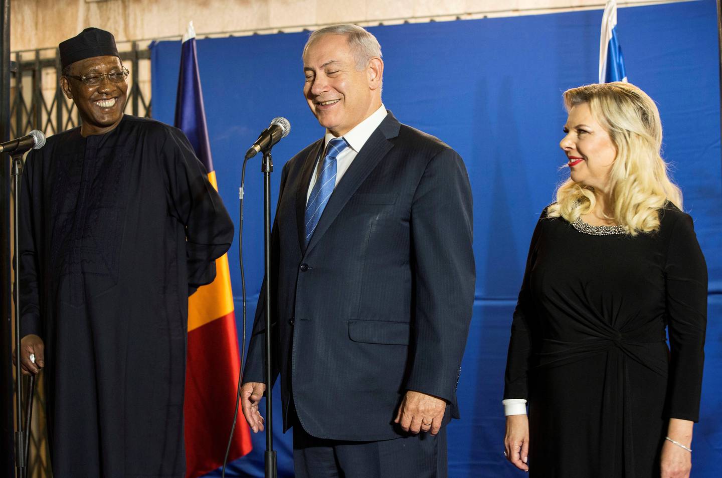 The Republic of Chad President Idriss Deby with Israeli Prime Minister Benjamin Netanyahu and his wife Sarah, before their dinner at the Prime Minister's residence in Jerusalem on Sunday Nov. 25, 2018. This is the first visit by a Chadian president since Israel was founded in 1948. (Heidi levine/Pool via AP)