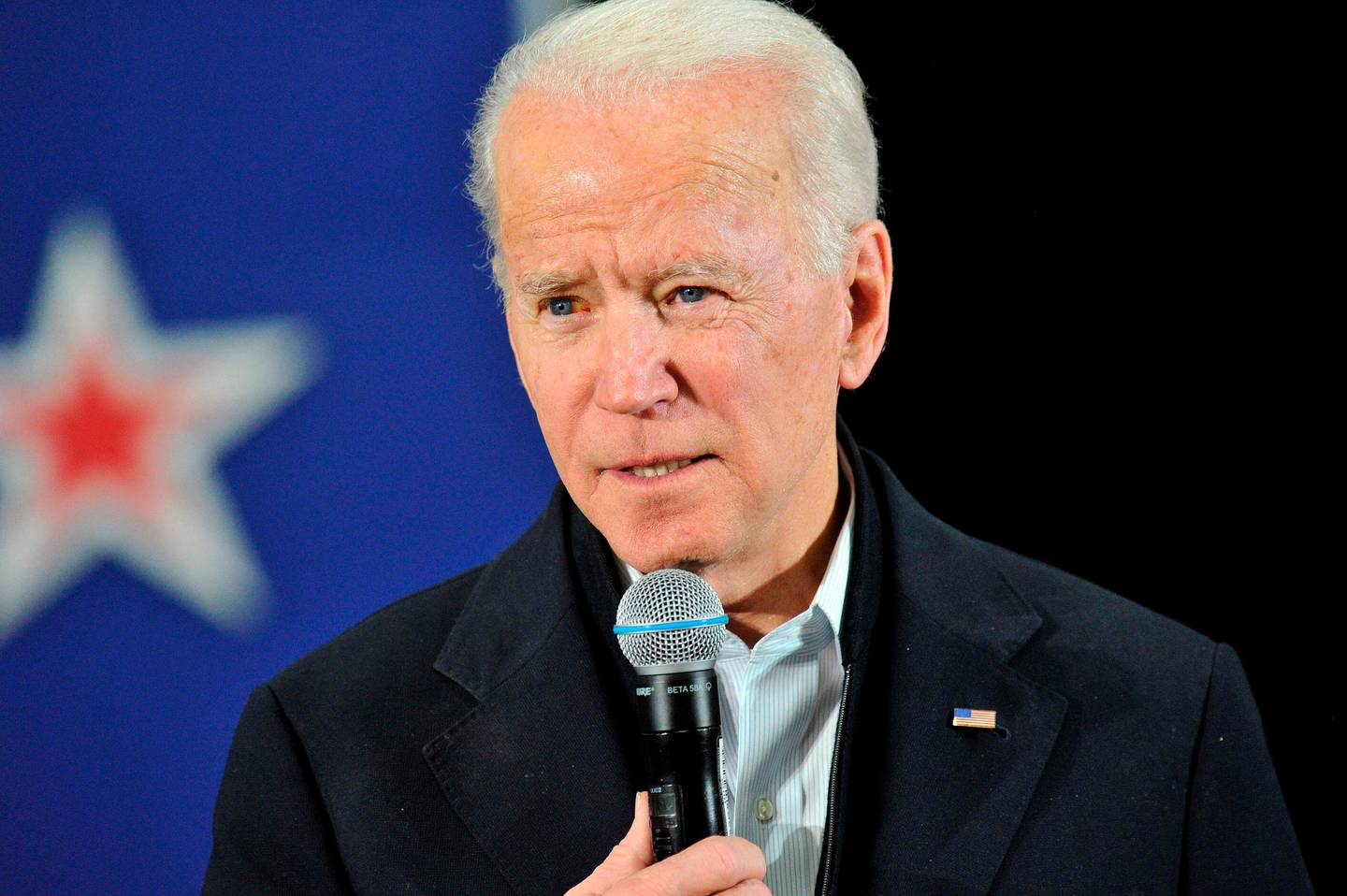 US Presidential candidate and former US Vice President Joe Biden addresses supporters and curious voters at the IBEW Local 490 in Concord, New Hampshire on February 4, 2020. - Democratic White House candidate Pete Buttigieg seized a shock lead in the chaotic Iowa caucuses, closely trailed by leftist senator Bernie Sanders, according to partial returns released on Tuesday after an embarrassing delay in reporting the results. Progressive standard-bearer Elizabeth Warren was in third place followed by Joe Biden, a disappointing showing for the former vice president who has claimed he is best positioned to defeat Donald Trump in November. (Photo by Joseph Prezioso / AFP)