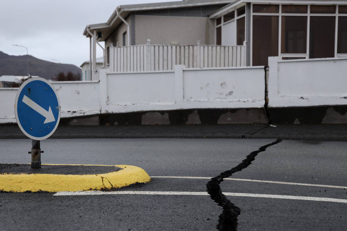 Cracks emerge on a road due to volcanic activity near a police station, in Grindavik, Iceland November 11, 2023.   RUV/Ragnar Visage/Handout via REUTERS    THIS IMAGE HAS BEEN SUPPLIED BY A THIRD PARTY. NO RESALES. NO ARCHIVES. MANDATORY CREDIT