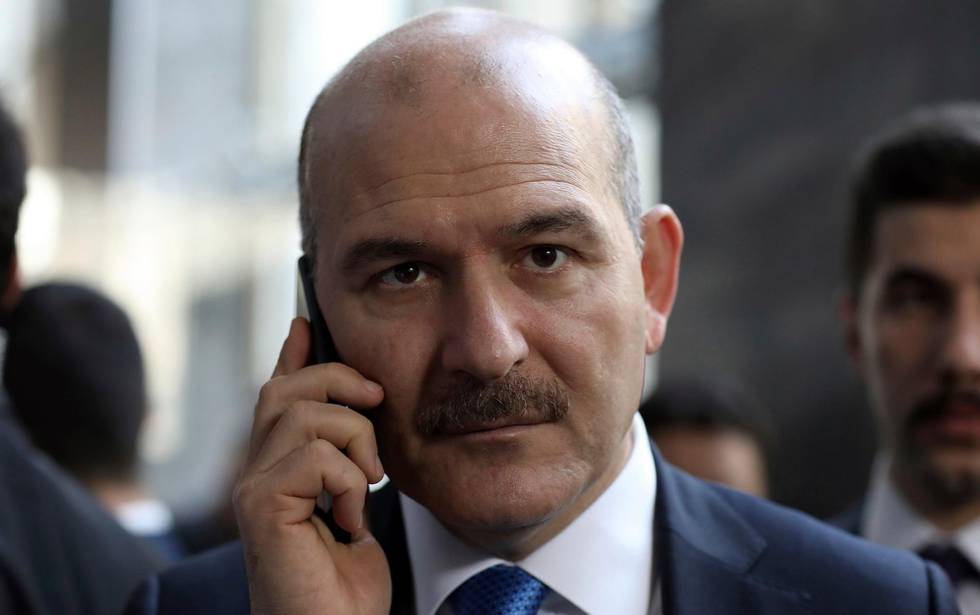 FILE - In this Wednesday, Nov. 5, 2019 file photo, Turkey's Interior Minister Suleyman Soylu speaks on the phone in Ankara, Turkey. Soylu says Turkey will start sending back Islamic State group members to their countries of origin next week. Soylu made the comments on Friday, Nov. 8 days after Turkey insisted that members of the extremist group held by Turkey would be returned regardless of countries revoking their citizenship. (AP Photo/Burhan Ozbilici, File)