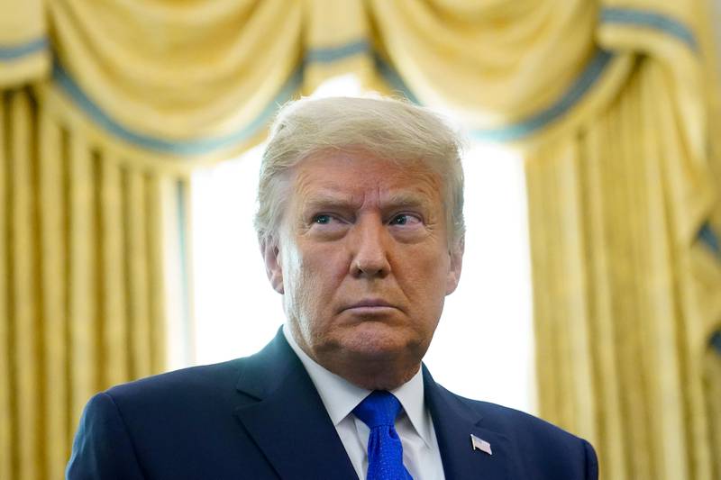 In this Dec. 7, 2020 photo President Donald Trump in the Oval Office of the White House in Washington. (AP Photo/Patrick Semansky)