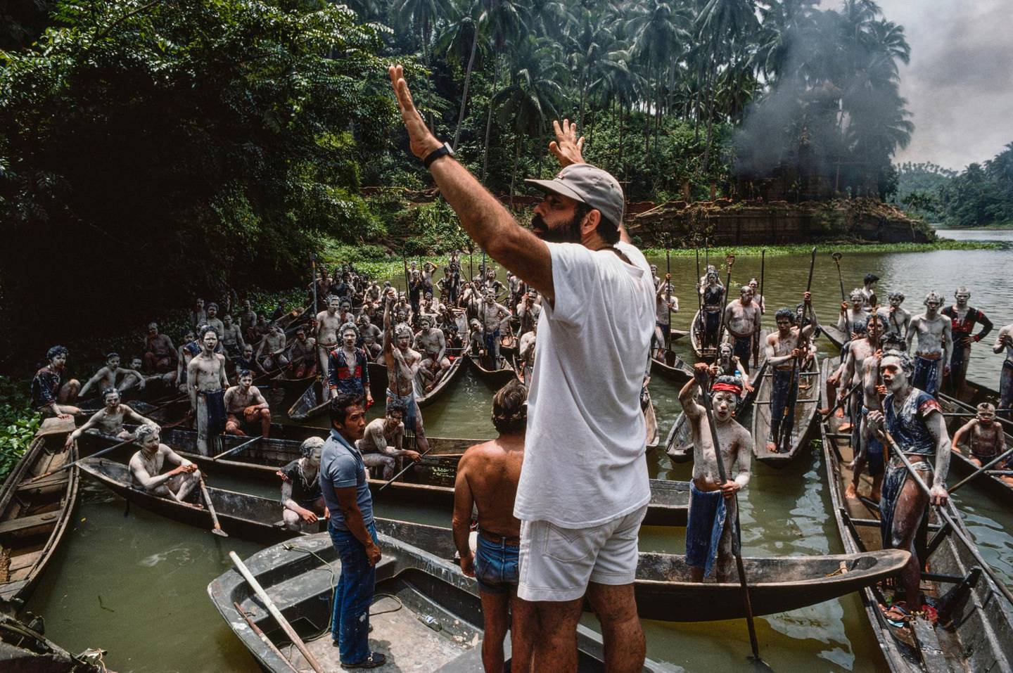 This image provided by Zoetrope Corp. shows director Francis Ford Coppola on location directing a scene in "Apocalypse Now Final Cut." The movie releases in theaters on Aug. 15. (Chas Gerretsen/Nederlands Fotomuseum/Zoetrope Corp. via AP)