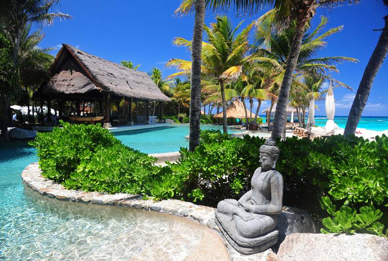 A statue decorates the pool area of Richard Branson's property on Necker Island in the British Virgin Islands, Friday, May 17, 2013.  Political and business leaders gathered here Friday to back an initiative aimed at expanding protection for the Caribbean's imperiled coasts and waters. Delegations from the participating governments signed a communique pledging to establish a framework for a regional approach to coastal conservation, including ?increasing considerably the number of marine protected areas.? They also said they recognized an urgent need to protect sharks and rays, and vowed a ?dramatic acceleration in the transition from fossil fuels to alternative energy sources over the next five years.? (AP Photo/Todd VanSickle)