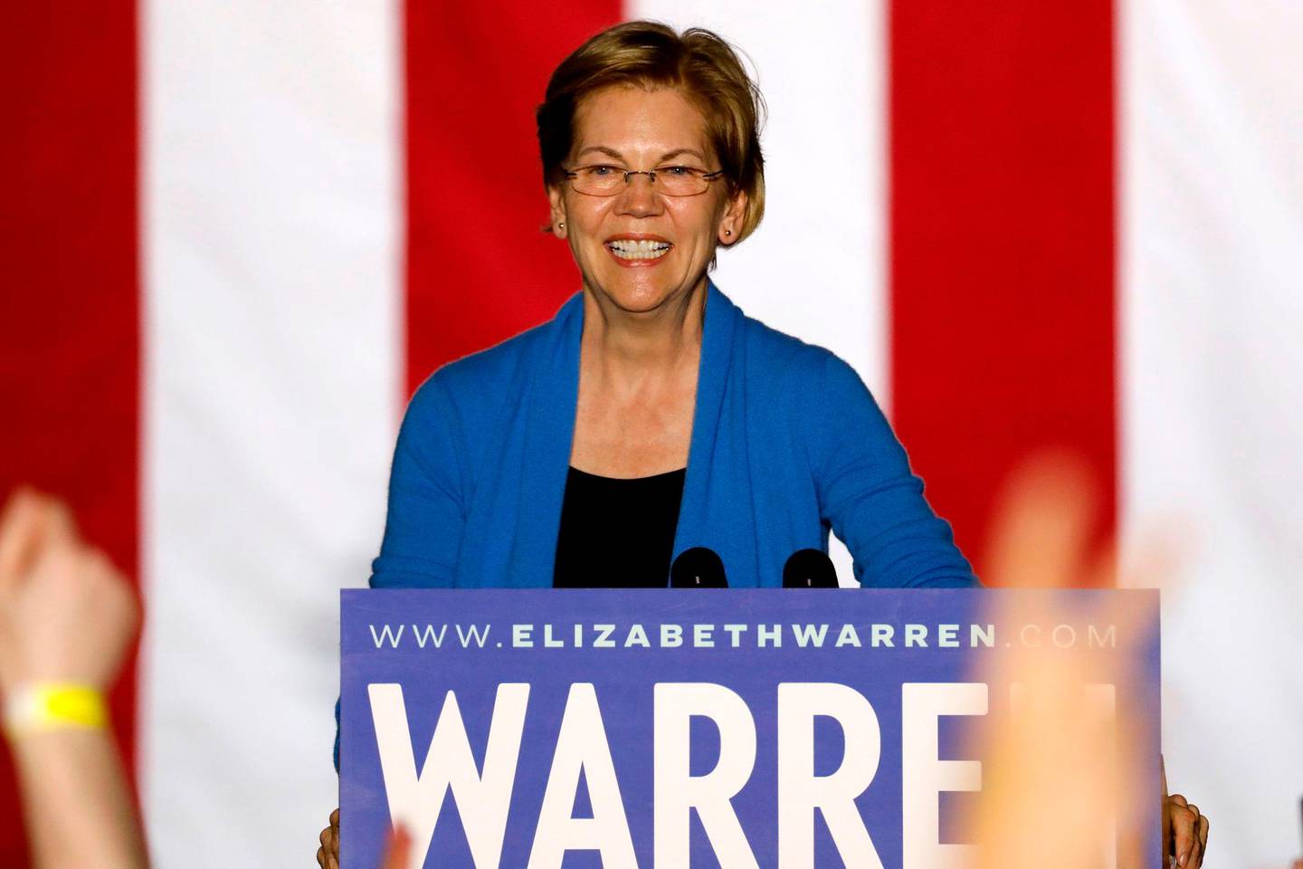 (FILES) In this file photo taken on March 03, 2020 (FILES) In this file photo Democratic presidential hopeful Massachusetts Senator Elizabeth Warren gestures as she speaks during a campaign rally at Eastern Market in Detroit, Michigan, on March 3, 2020. - Elizabeth Warren, once a frontrunner in the Democratic contest for the White House, is dropping out of the race, US media reported Thursday, following a poor showing in several statewide votes this week. Warren, a 70-year-old progressive senator from Massachusetts, will hold a call with her campaign staff Thursday and announce that she is suspending her bid for the party's presidential nomination, a source familiar with the plans told CNN. (Photo by JEFF KOWALSKY / AFP)