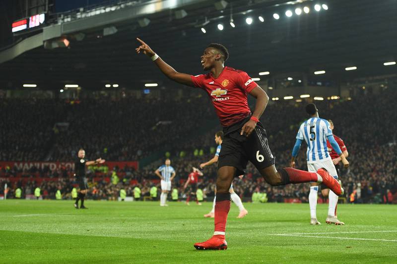 Manchester United's French midfielder Paul Pogba celebrates scoring their second goal during the English Premier League football match between Manchester United and Huddersfield Town at Old Trafford in Manchester, north west England, on December 26, 2018. (Photo by Oli SCARFF / AFP) / RESTRICTED TO EDITORIAL USE. No use with unauthorized audio, video, data, fixture lists, club/league logos or 'live' services. Online in-match use limited to 120 images. An additional 40 images may be used in extra time. No video emulation. Social media in-match use limited to 120 images. An additional 40 images may be used in extra time. No use in betting publications, games or single club/league/player publications. / 