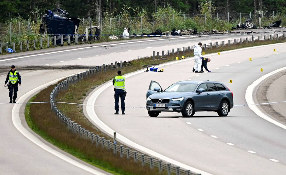 Forensic technicians work at the scene after a traffic accident between a car and a lorry,which killed three people including the Swedish artist Lars Vilks, outside the town of Markaryd in Sweden, October 4, 2021. TT News Agency/Johan Nilsson/via REUTERS  ATTENTION EDITORS - THIS IMAGE WAS PROVIDED BY A THIRD PARTY. SWEDEN OUT. NO COMMERCIAL OR EDITORIAL SALES IN SWEDEN.