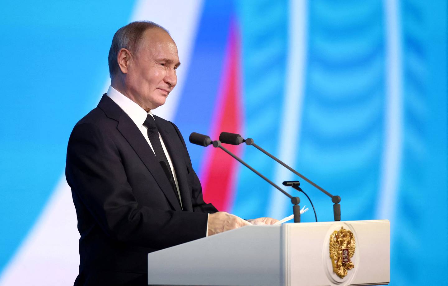 In this pool photograph distributed by Russian state owned agency Sputnik, Russian President Vladimir Putin speaks during an event marking the 50th anniversary of the launch of the Baikal-Amur Mainline (BAM) construction, at the State Kremlin Palace in Moscow, on April 23, 2024. (Photo by Valery SHARIFULIN / POOL / AFP) / ** Editor's note : this image is distributed by Russian state owned agency Sputnik **