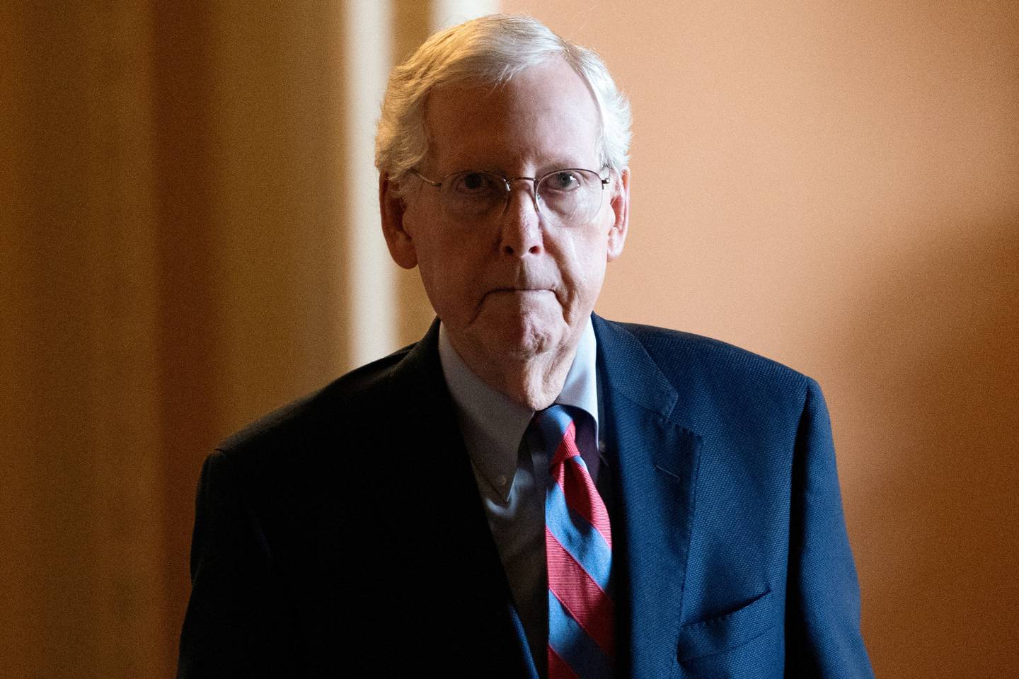 FILE PHOTO: U.S. Senate Minority Leader Mitch McConnell (R-KY) walks to the Senate floor before the vote to begin work on a bill that includes aid for Ukraine, Israel and Taiwan, at the U.S. Capitol in Washington, U.S., February 9, 2024. REUTERS/Nathan Howard/File Photo