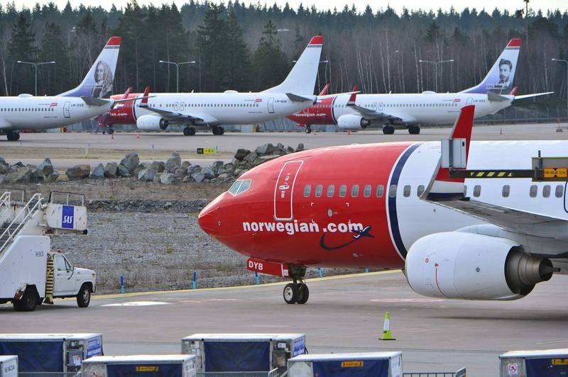 (FILES) This file photo taken on March 5, 2015 shows aircrafts of Norwegian low-cost airline Norwegian Air Shuttle on the tarmac at Arlanda airport in Stockholm, Sweden. +++ SWEDEN OUT +++
The battle is on in Barcelona, Spain's popular Mediterranean city where two airlines have started competing for passengers in the emerging trend of low cost, long-haul flights.
A first flight operated by Level, a new carrier created by IAG, the parent company of British Airways and Spain's Iberia, took off on June 1, 2017 from El Prat airport to Los Angeles. The airline also flies to San Francisco, Buenos Aires and Punta Cana in the Dominican Republic. Meanwhile Norwegian, a pioneer in cheap long-distance flights, takes off from on June 5, 2017 to New York, Los Angeles, Miami and San Francisco.
 / AFP PHOTO / TT NEWS AGENCY / JOHAN NILSSON