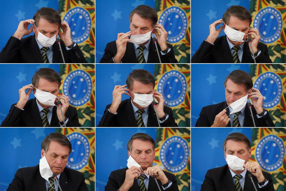 A combination of picture shows Brazil's President Jair Bolsonaro adjusting his protective face mask during a press statement to announce federal judiciary measures to curb the spread of the coronavirus disease (COVID-19) in Brasilia, Brazil March 18, 2020. Pictures taken March 18, 2020. REUTERS/Adriano Machado     TPX IMAGES OF THE DAY