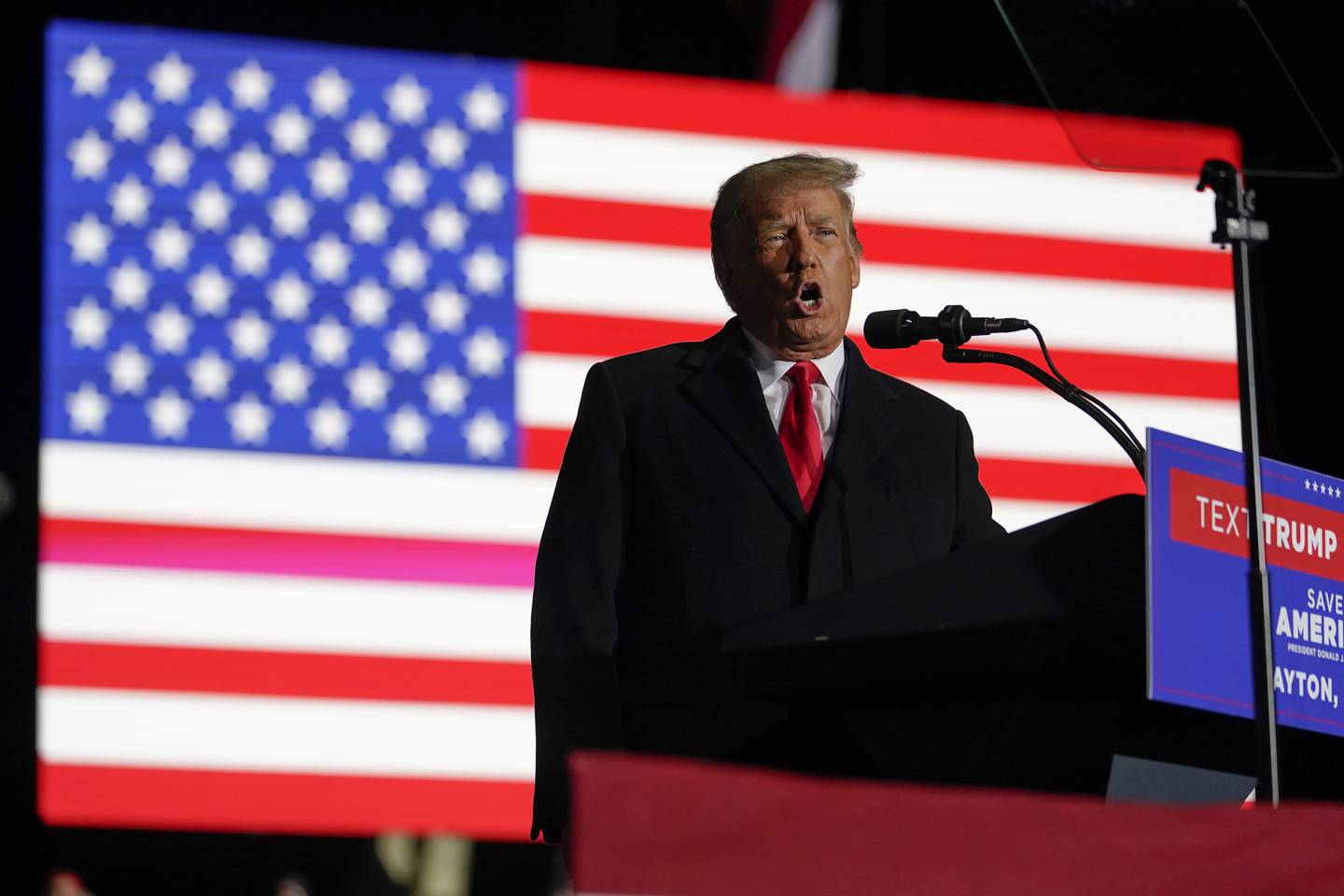Former President Donald Trump speaks at a campaign rally in support of the campaign of Ohio Senate candidate JD Vance at Wright Bros. Aero Inc. at Dayton International Airport on Monday, Nov. 7, 2022, in Vandalia. (AP Photo/Michael Conroy)