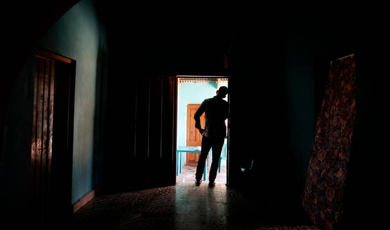 In this Aug. 23, 2019, photo, a Honduran father stands at his home in Comayagua, Honduras, after talking in an interview about being separated from his 3-year-old daughter at the border after traveling for weeks to seek asylum in the U.S. According to court records, his daughter was sexually abused in U.S. foster care. She was later deported and arrived back in Honduras withdrawn, anxious and angry. He fears their bond is forever broken. (AP Photo/Elmer Martinez)