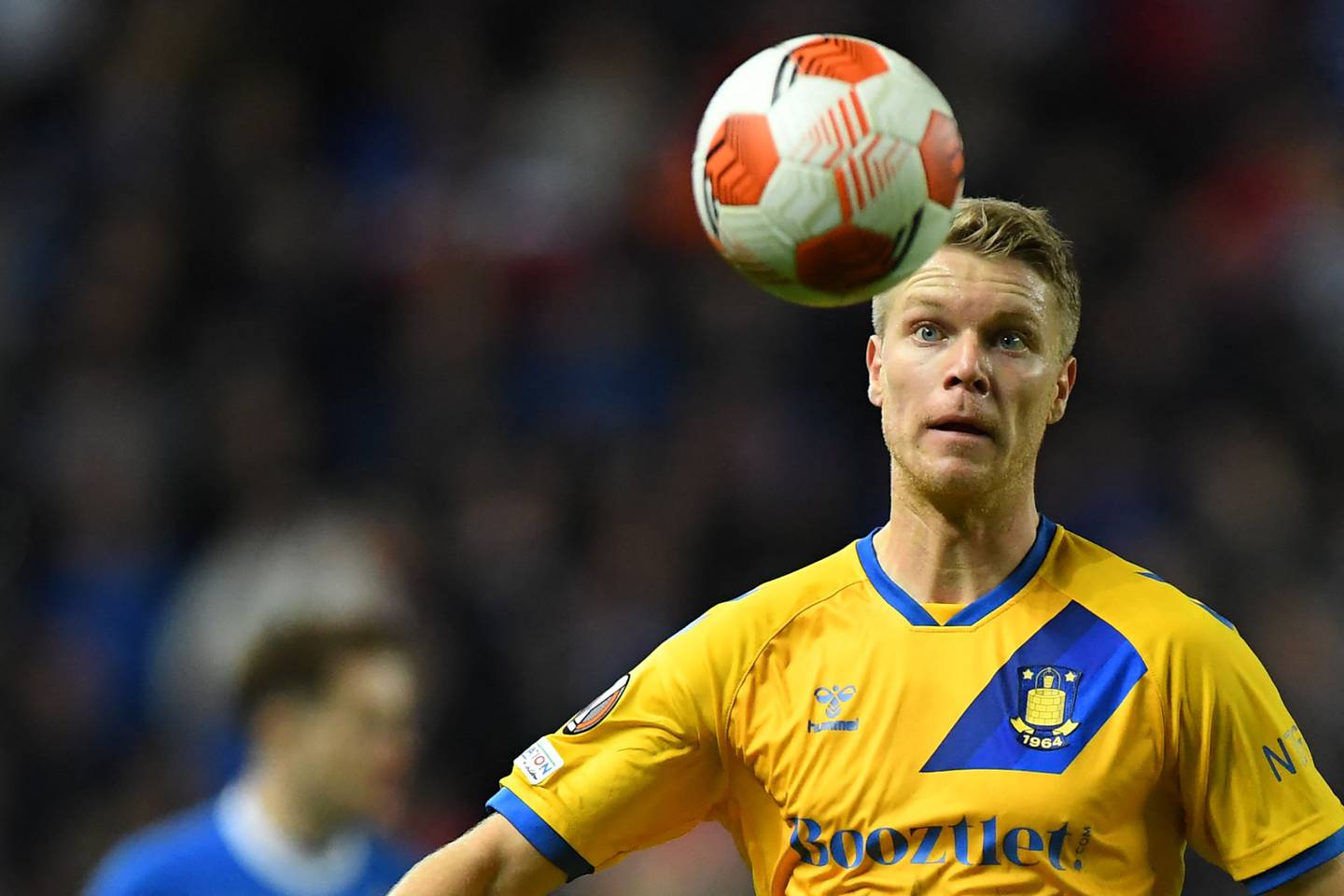 Brondby's Norwegian defender Sigurd Rosted keeps his eye on the ball during the UEFA Europa League group A football match between Rangers and Brondby at the Ibroxii Stadium in Glasgow on October 21, 2021. (Photo by ANDY BUCHANAN / AFP)