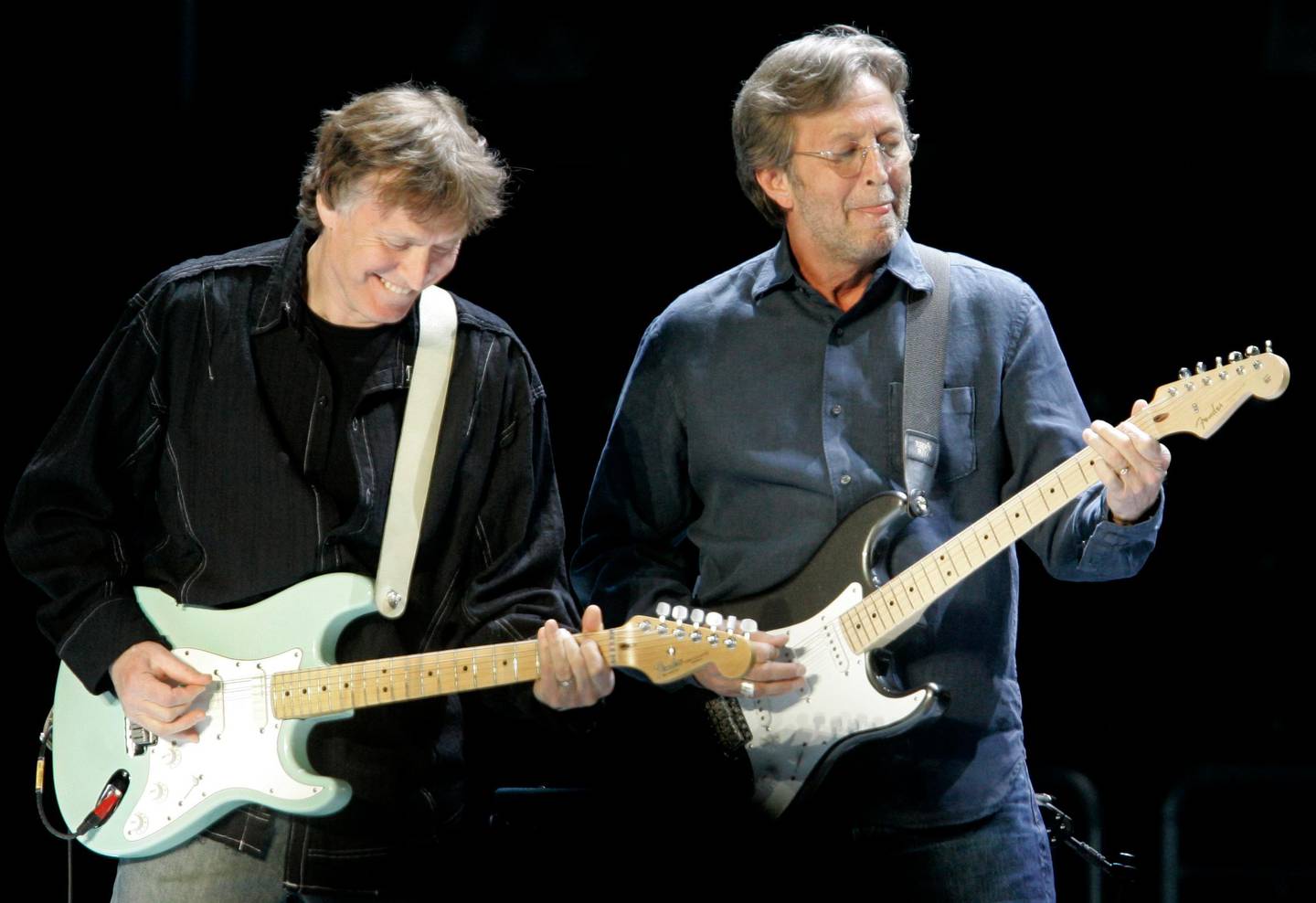 Former Blind Faith bandmates Steve Winwood, left, and Eric Clapton perform Monday evening Feb. 25, 2008, during the first of their three concerts at New York's Madison Square Garden. (AP Photo/Richard Drew)