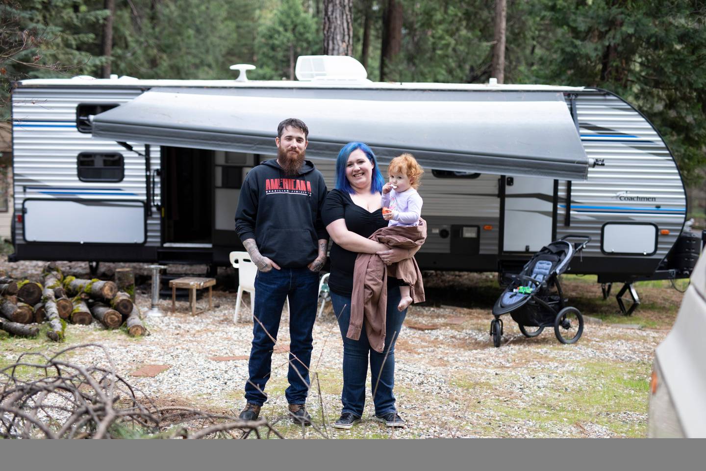 The Cox Family in front of their trailer in Magalia, CA in REBUILDING PARADISE. (National Geographic/Lincoln Else)