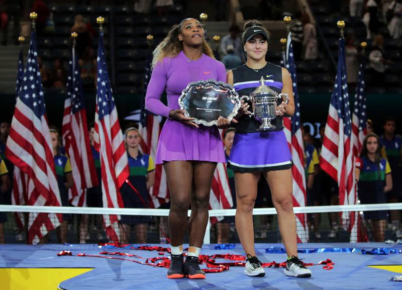 Serena Williams, of the United States, left, and Bianca Andreescu, of Canada, pose for photos after Andreescu won the women's singles final of the U.S. Open tennis championships Saturday, Sept. 7, 2019, in New York. (AP Photo/Charles Krupa)