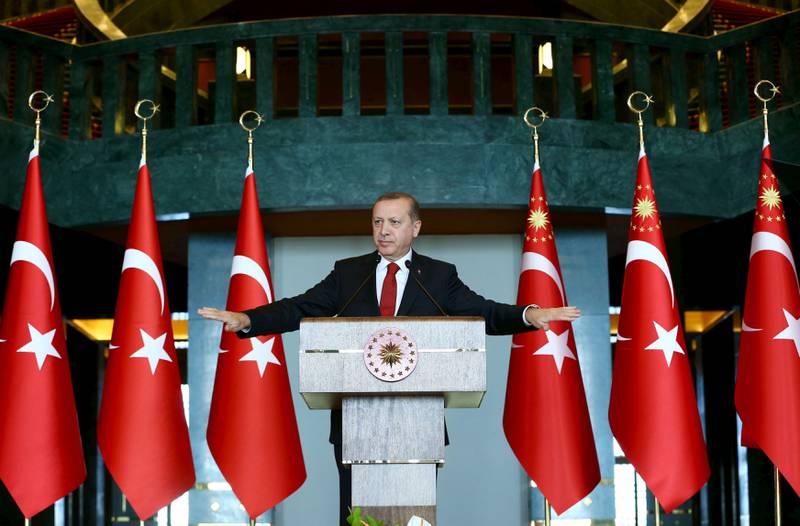 President Recep Tayyip Erdogan gikk til angrep på Tyrkias kritikere i en tale etter angrepene: «Enten er du på tyrkiske myndigheters side eller du er på lag med terroristene». FOTO: NTB SCANPIX